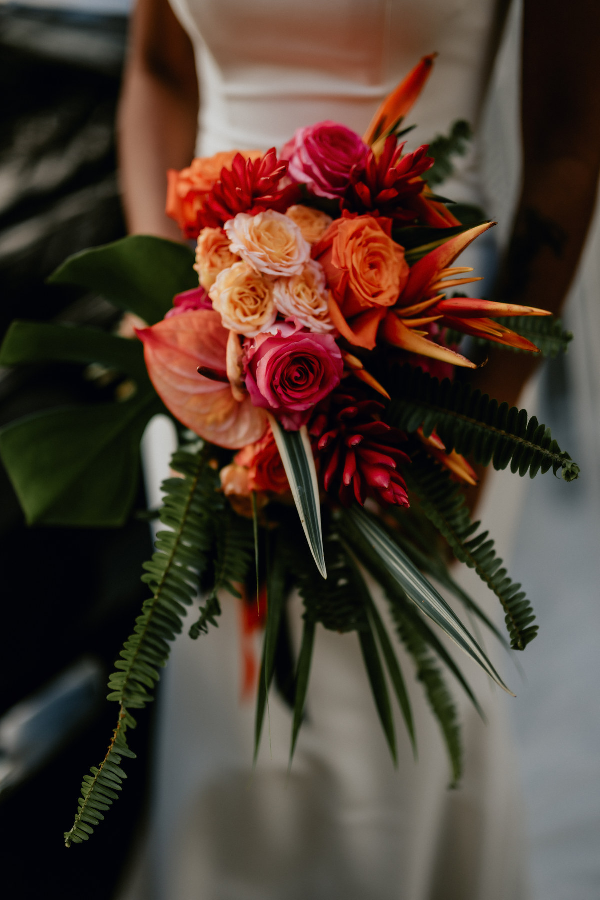 Bouquet de mariée tropical aux tons rouge et orange